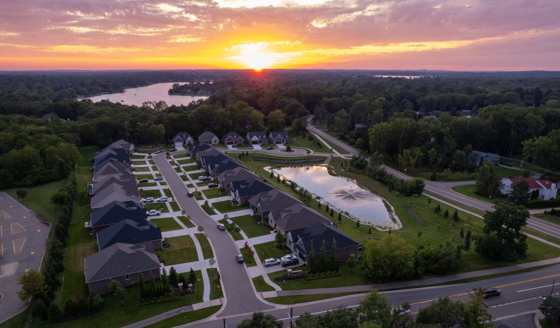 Sunrise over a neighborhood filled with custom homes